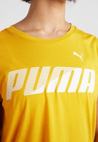 Puma Print T-shirt - yellow