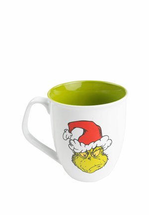 White ceramic mug with a green interior featuring an illustration of the Grinch wearing a red Santa hat.