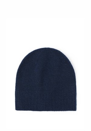 Bonnet tricoté bleu foncé avec un bord côtelé en bas, présenté sur fond blanc.