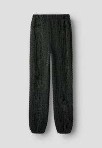 Pantalon noir texturé avec un motif froissé, doté d'une ceinture élastique et de poignets fuselés. Confectionné dans un matériau doux et léger.