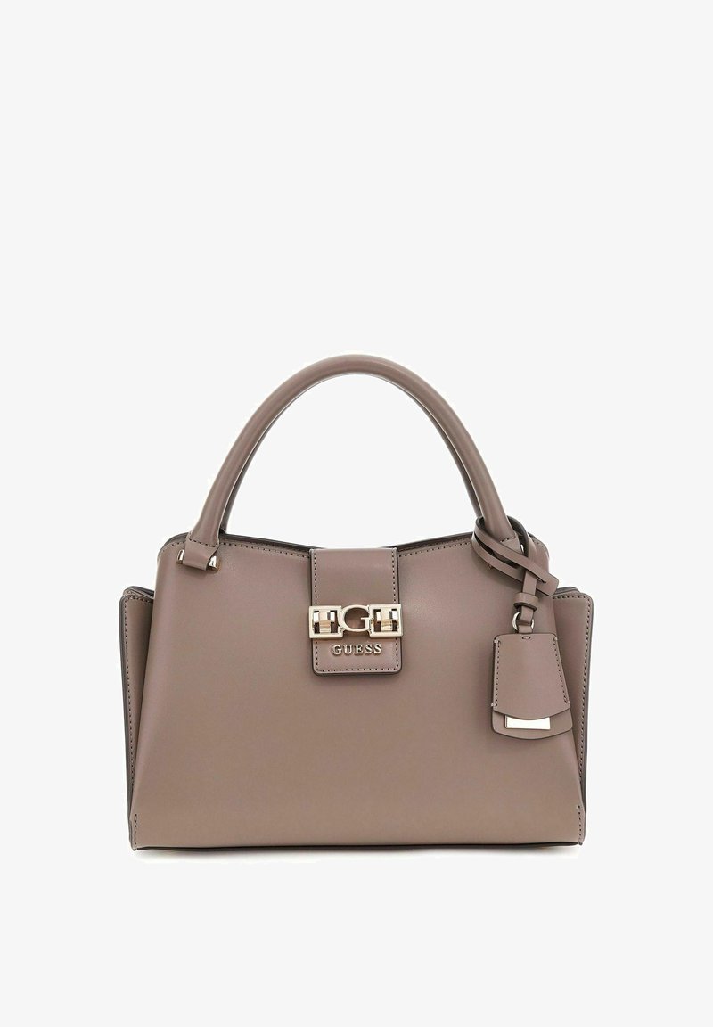 Sac à main en synthétique marron avec un design structuré, deux poignées, un fermoir à l'avant, des accents métalliques et une étiquette amovible.