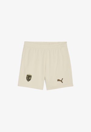 Beige Sportshorts mit elastischem Bund. Enthält ein schwarzes und goldenes Emblem am linken Oberschenkel und ein goldenes Logo auf der rechten Seite.