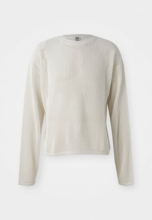 Long-sleeve knit sweater in off-white with a loose, textured mesh design and a rounded neckline. Features ribbed cuffs and hem.