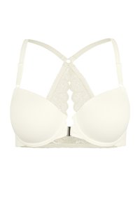 Witte gewatteerde bh met kanten details, kruisende bandjes en een decoratieve sluiting. Gladde stof met ingewikkelde kanten accenten.