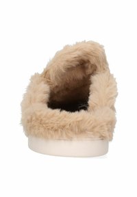 Scarpa slip-on beige con fodera in pelliccia, caratterizzata da una texture morbida, una forma arrotondata e una suola piatta, progettata per comfort e facilità d'uso.