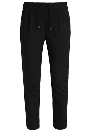 Schwarze, zulaufende Hose mit elastischem Bund und Kordelzug, mit Seitentaschen und glattem, knitterfreiem Stoff.