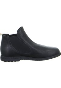 Stivale alla caviglia in pelle nera con pannelli elastici laterali, punta arrotondata, superficie texture e suola in gomma resistente. Presenta un piccolo occhiello a strisce.