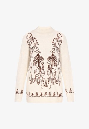 Kreemipehme sviiter pruunide lillede tikanditega ja ümarate kraega. Sellel on pikad varrukad ja dekoratiivne õmblus allservas.