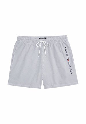 Bañador de rayas en azul y blanco. Presenta una cintura elástica con cordón y un logotipo prominente en la pierna izquierda.