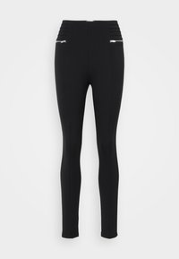 Zwarte leggings van rekbare stof, met een gladde structuur, hoge tailleband met plooien, en twee ritssluitingen aan de voorkant.