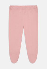 Leggings roses en tissu doux ; dotés d'une taille élastique ; conçus avec un design à pieds, une texture lisse et sans motifs ni accents visibles.