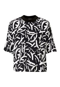 Haut à manches courtes noir et blanc avec un motif de coups de pinceau abstrait, encolure arrondie et texture de tissu douce.