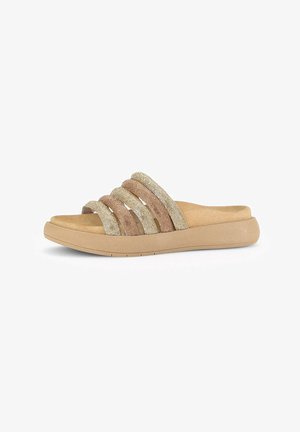 Slide sandal with beige and gold textile straps and a cushioned tan sole. Features wide bands with a textured finish.
