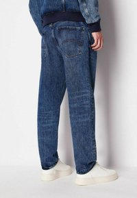 Armani Exchange Jeans Tapered Fit - denim medio scuro