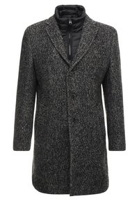 Donkergrijze tweed overjas met drie knopen en een zwarte gewatteerde binnenste ritssluiting kraaglaag.