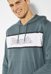 Bench Hoodie - hellpetrol