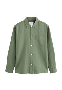 Zelena majica z dolgimi rokavi iz teksturirane tkanine, z gumbno ovratnico, sprednjim žepom in belimi gumbi.
