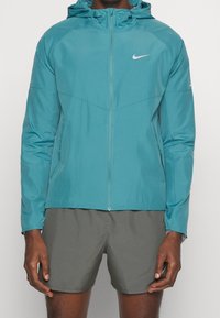 Nike Performance Windbreakers - mint