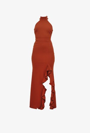 Long, fitted red dress with a halter neck, featuring a ruffled side detail and a high slit. Smooth, stretchy fabric. Elegant design.