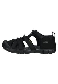 Black sport sandals with adjustable webbing straps, rubber sole, and a textured footbed. Features the brand logo on the side.