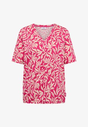 Blouse rose à manches courtes avec motif abstrait de feuilles beige, col en V et ourlet élastique, étiquette "Cecil" à l'intérieur du col.