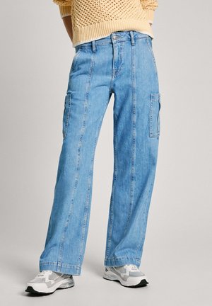 Light blue denim cargo pants with a straight-leg design, featuring side pockets and contrasting stitching details.