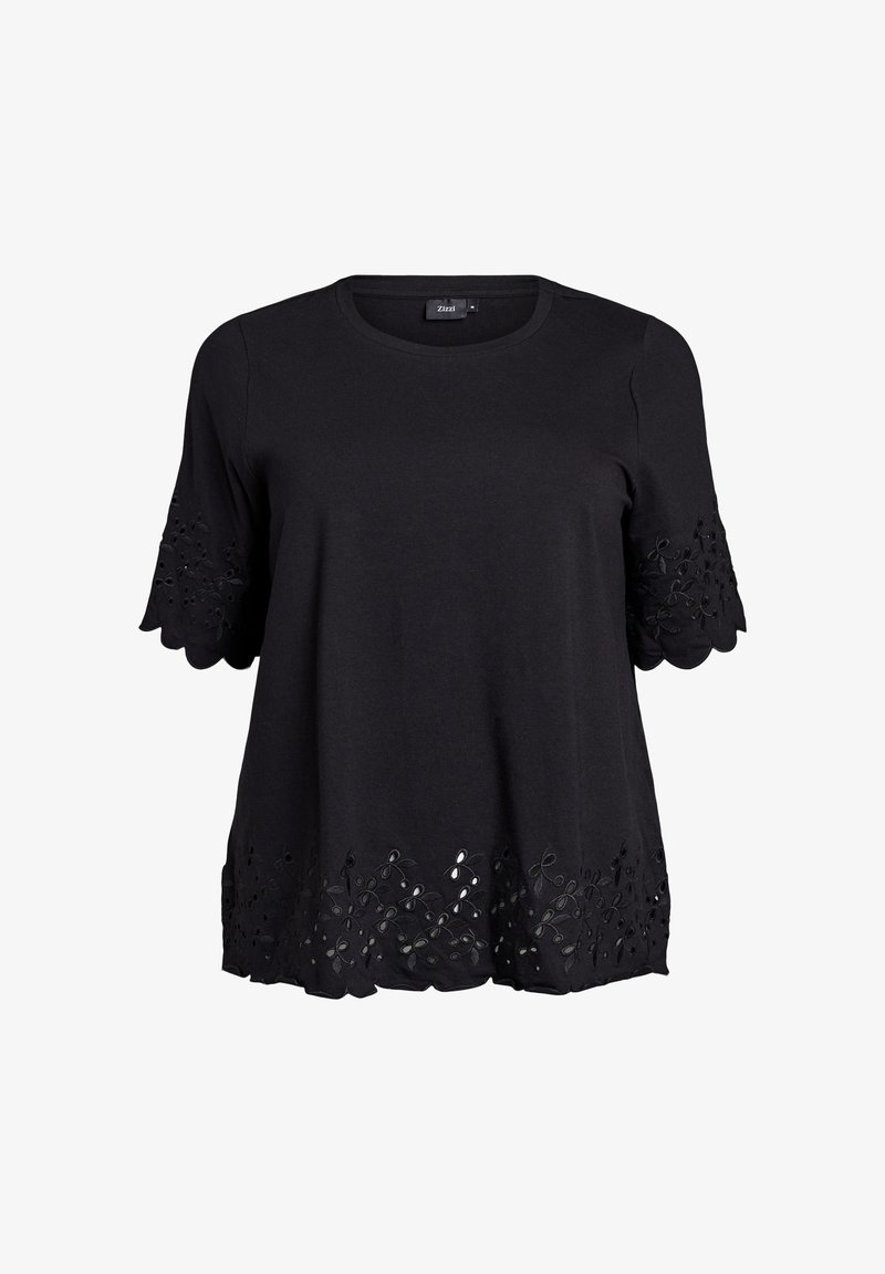 Sort kortærmet top lavet af bomuld, med broderede detaljer på ærmerne og et dekorativt udskåret blomsterdesign i kanten.