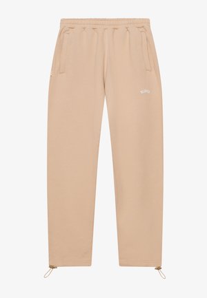 Beige szabadidőnadrág, rugalmas derékkal, két oldalsó zsebbel és állítható bokarészekkel. Elöl fehér szöveges logó található.