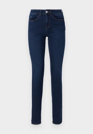Donkerblauwe skinny jeans van denim, met een voorkant knoopsluiting, riemlussen en subtiele stiksels. Geschikt voor casual kleding.
