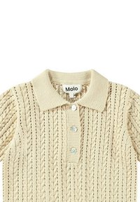 Maglietta polo in maglia color crema, con un motivo testurizzato, tre bottoni sul colletto e un tessuto morbido e traspirante. Etichetta con la scritta "Molo."