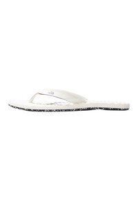 White flip-flop sandal with a textured sole and black speckled bottom. Features a smooth, slender strap with a logo accent.