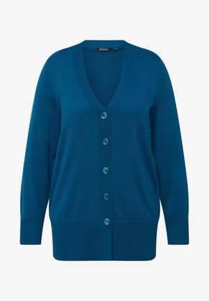 Tyrkysový pletený kardigán s výstrihom do V, dlhými rukávmi a šiestimi zodpovedajúcimi gombíkmi vpredu. Mäkko sa dotýka a má rebrované manžety.