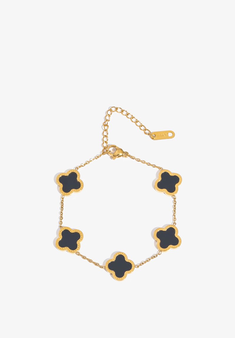 Gold chain bracelet with five black clover-shaped charms and a lobster clasp closure with adjustable links.