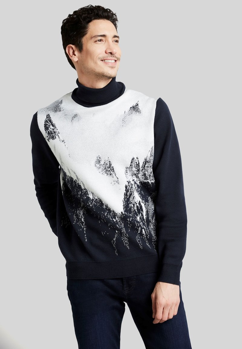 Strickpullover mit schwarzem Grundton und weißem Bergmotiv auf der oberen Vorderseite. Rippenbündchen und -saum sorgen für eine taillierte Passform.