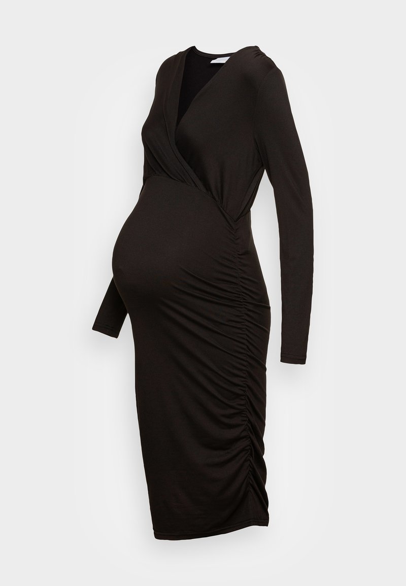 Robe de maternité noire à manches longues, décolleté en V, avec des détails froncés sur le côté, fabriquée en tissu stretch doux pour le confort et l'ajustement.
