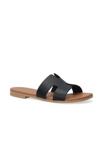 Zwarte slidesandalen met drie brede banden en open tenen. Platte zool met een lichtbruine afwerking. Nauwelijks een structuur met een minimalistisch ontwerp.