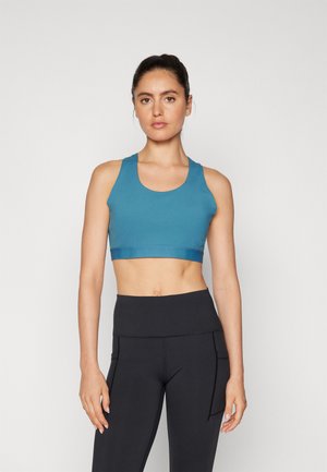 New Balance SLEEK MEDIUM SUPPORT POCKET BRA - Sutien sport cu susținere medie - terrarium