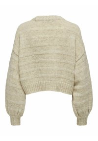 Pull en crochet beige clair, présentant un design boxy court, des manches larges, des poignets côtelés et une texture rayée subtile sur l'ensemble.