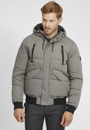 Gray puffer jacket with a hood, featuring a zippered chest pocket, side pockets, ribbed cuffs, and a durable fabric texture.