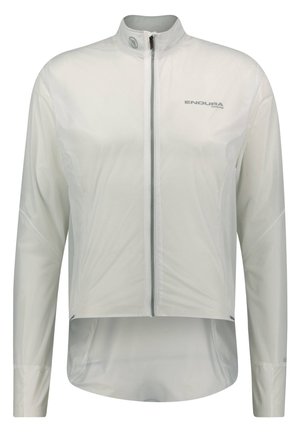 Weißer Windbreaker mit langen Ärmeln, Reißverschlüssen und hohem Kragen. Reflektierendes Logo auf der Brust und ein längerer hinterer Saum. Leichtes Material.