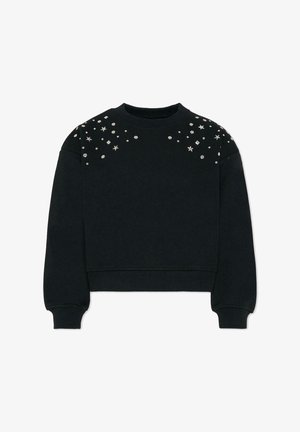 Czarna krótka bluza z bawełny z długimi rękawami, ozdobiona srebrnymi gwiazdkami i kamieniami na ramionach.