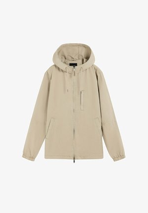 Beige hooded jacket with full front zipper, drawstring hood, elastic cuffs, two side pockets, and one vertical chest pocket.