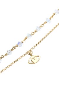 Armbandet i guldton har klara kristallpärlor och en liten ögonberlock med stämpel 925, och visar upp intrikata detaljer i tråd och kedja.