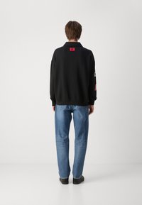 HUGO DANWYLL - Sudadera - black