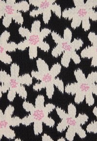 Floral textile featuring white and light pink flowers on a black background, with a textured weave pattern throughout.