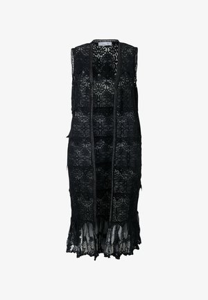 Robe en dentelle noire, dotée d'un style long et gilet, de motifs complexes, d'un ourlet festonné et d'une texture en couches. Ouverture à l'avant sans manches.