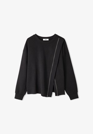 Sweatshirt noir avec un col rond, des épaules tombantes et un détail de fermeture éclair sur le côté. Fabriqué en tissu doux avec une coupe décontractée.