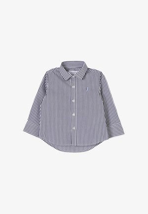 Camicia a maniche lunghe a righe blu navy e bianche con colletto button-down, bottoni frontali e orlo curvo. Presenta un piccolo logo sul petto.