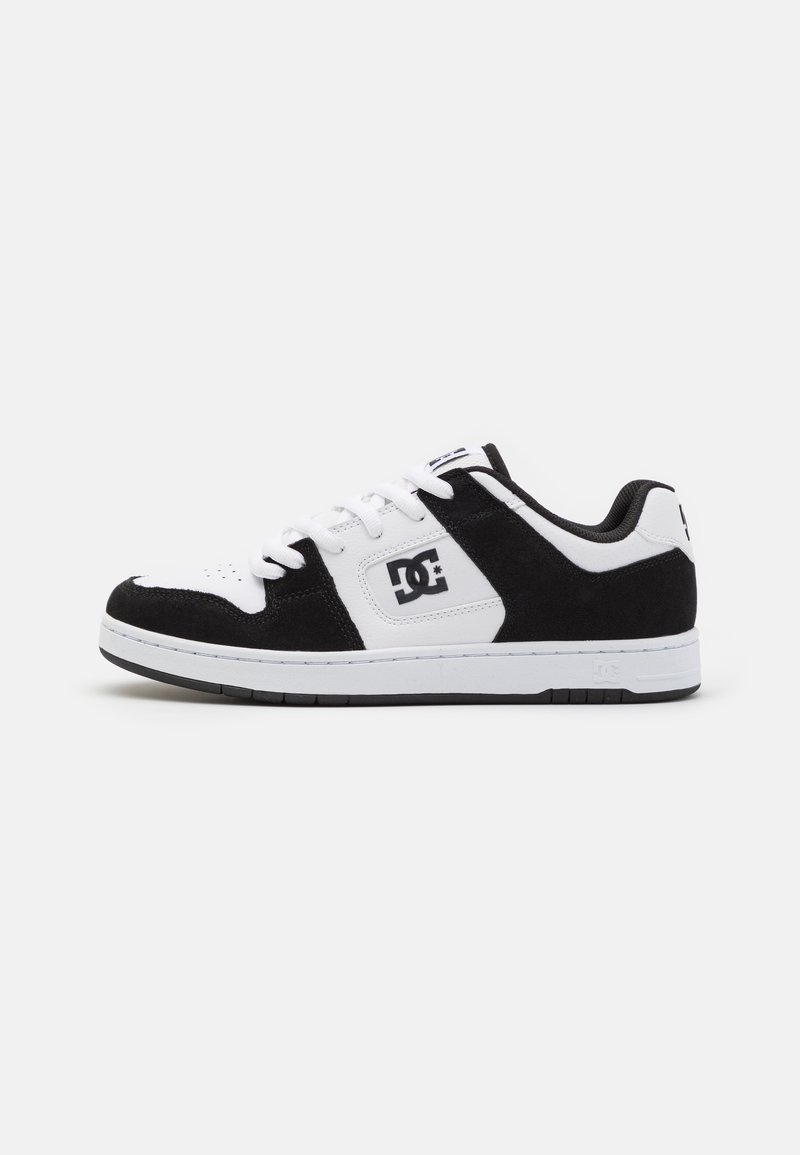 Black and white sneaker with a combination of leather and suede materials, featuring perforated toe, textured accents, and logo detail.