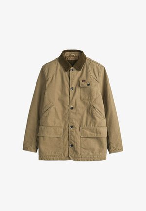 Giacca marrone con bottoni, colletto in velluto a coste, una tasca sul petto con patta, due tasche frontali con patta e due tasche laterali a fessura.